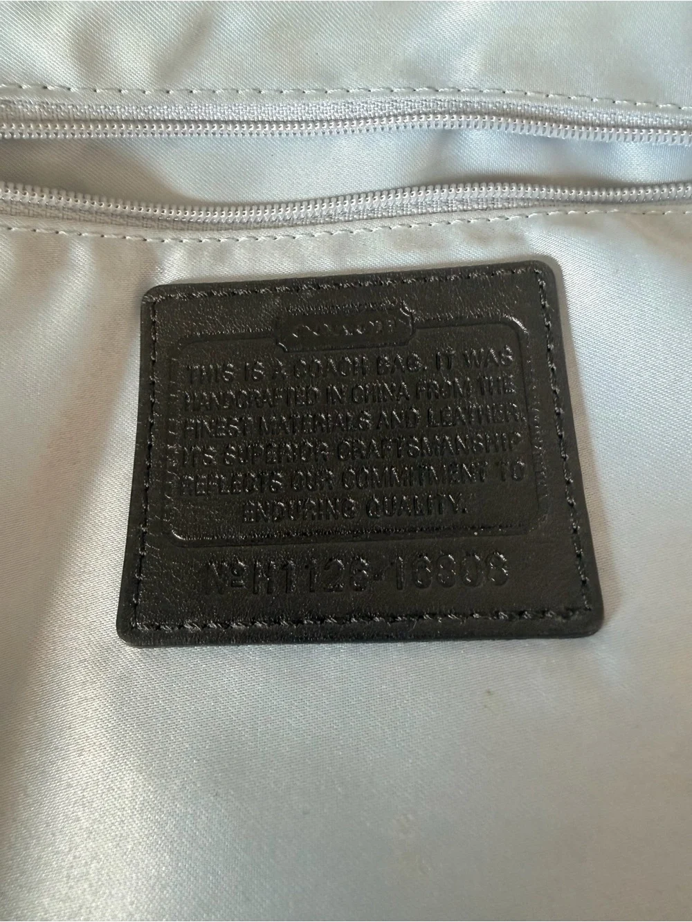 Coach Black Leather Shoulder Bag with Silver Turn-Lock